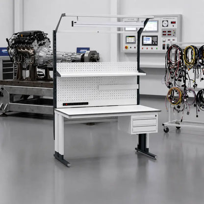 Workbench with tools and equipment in a workshop setting
